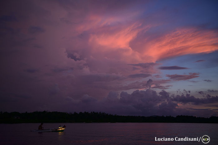 From Expedition: Danajon Bank : A lantern fisher begins a long night of fishing. One of the oldest techniques still used in the Philippines, it is also one of the most sustainable, involving only small homemade spears. It requires incredible patience and skill. As the supply of fish on Danajon Bank has dwindled in recent decades, traditional lantern fishers struggle to make a living. A 120hour trip will yield a catch worth about US $2.50 on average. Photo: Luciano Candisani/iLCP
