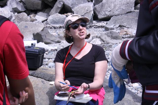 Dr Sigal Balshine teaching on the beach