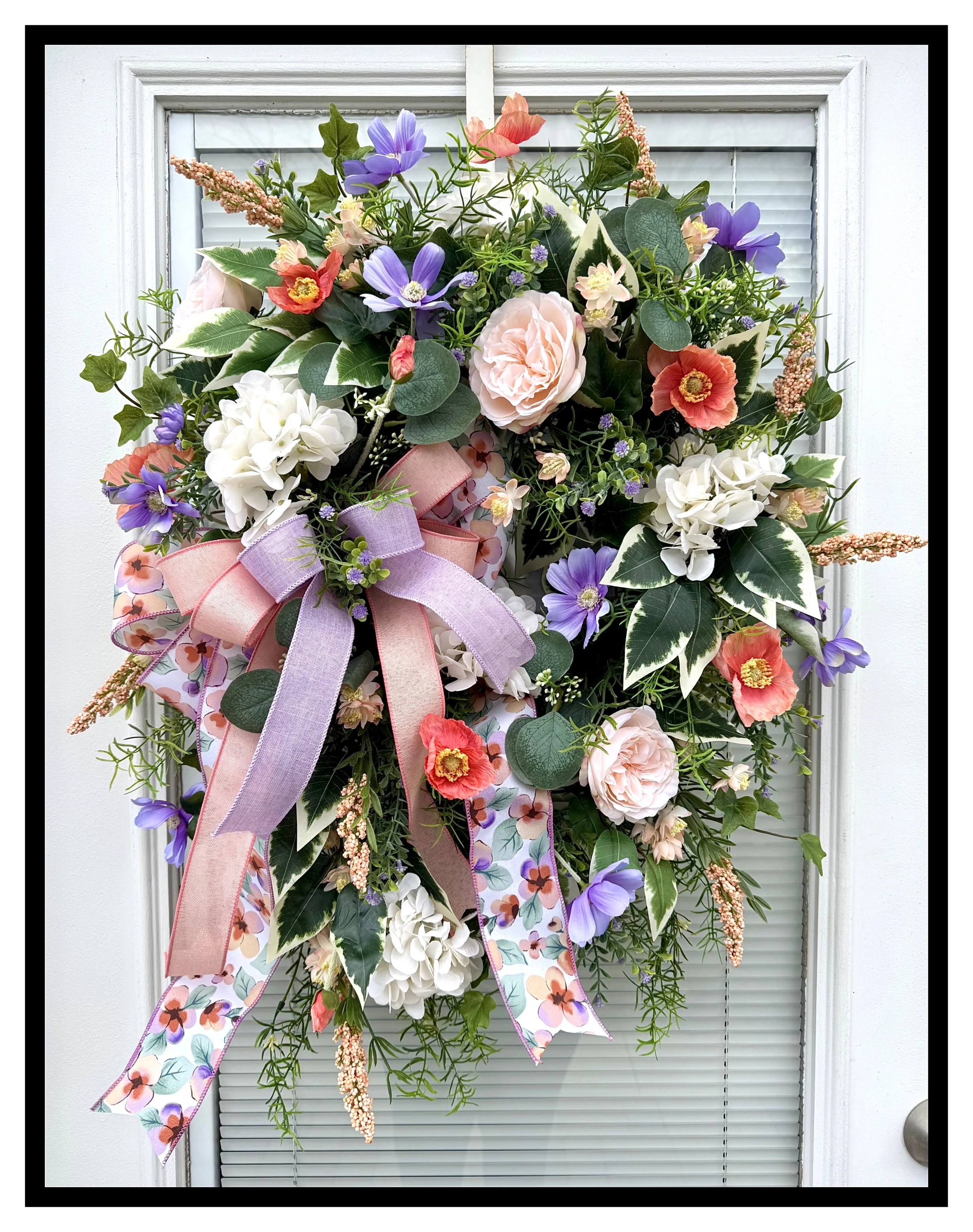 spring summer wreath white hydrangeas peach cabbage roses lavender cosmos coral poppies