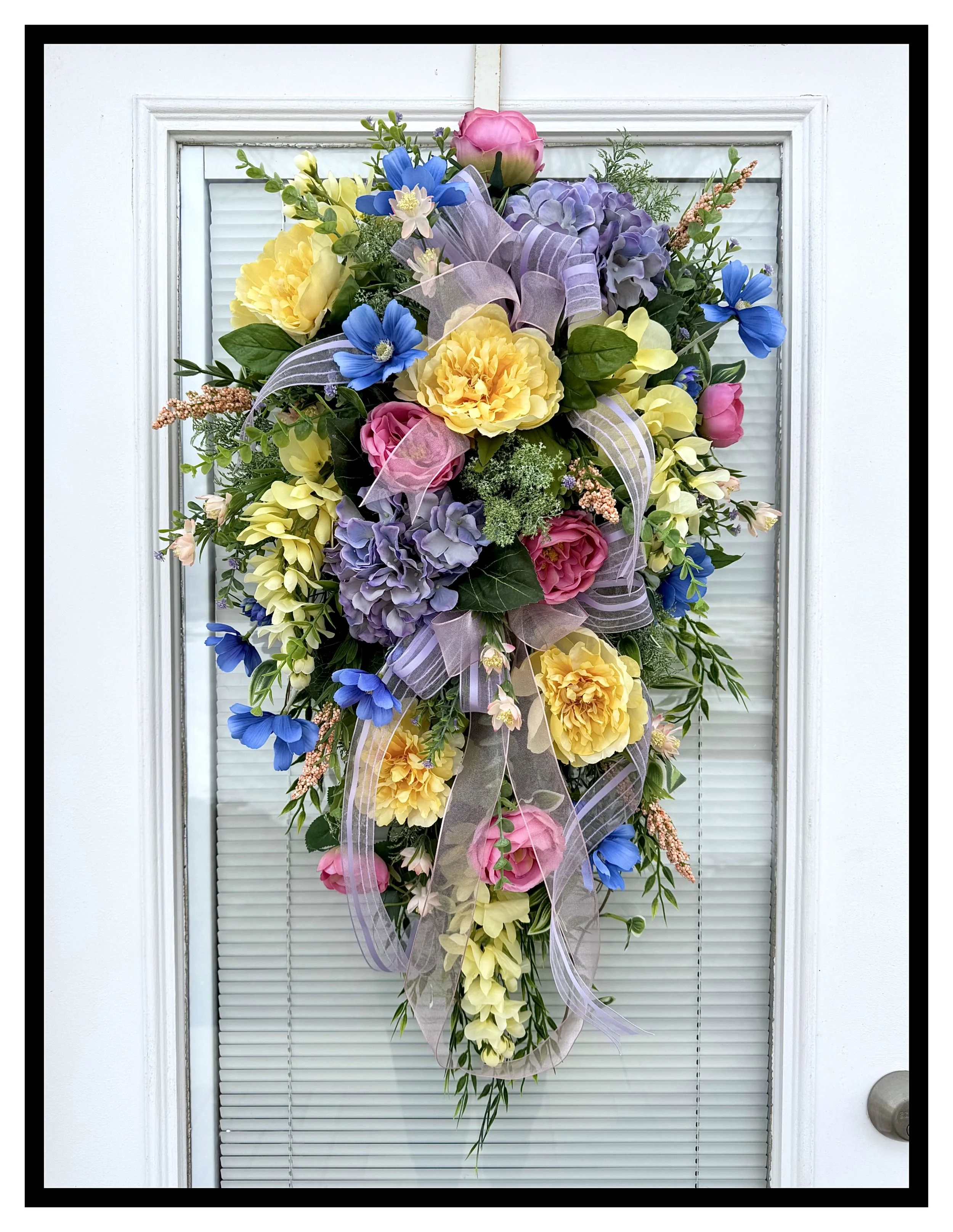 floral door swag yellow peonies lavender hydrangeas blue cosmos deep pink roses