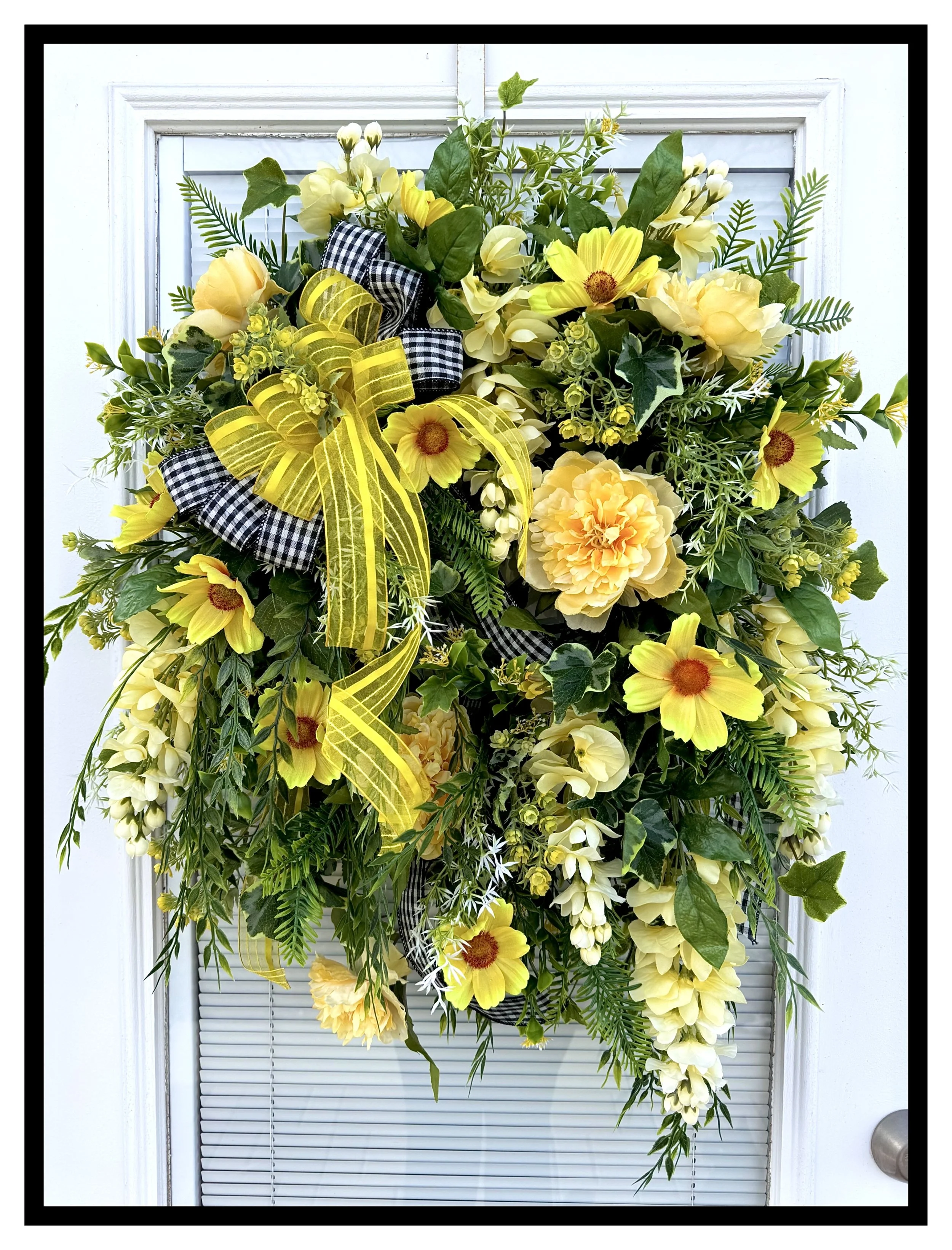 floral door wreath with shades of yellow