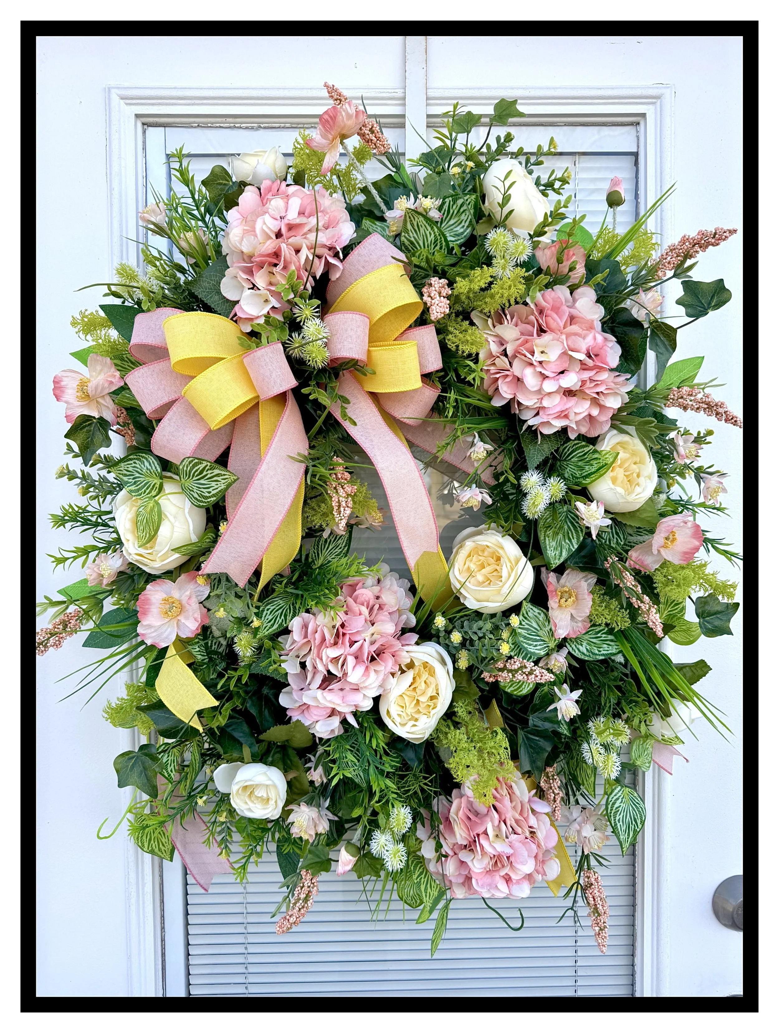 exquisite coral and yellow floral wreath