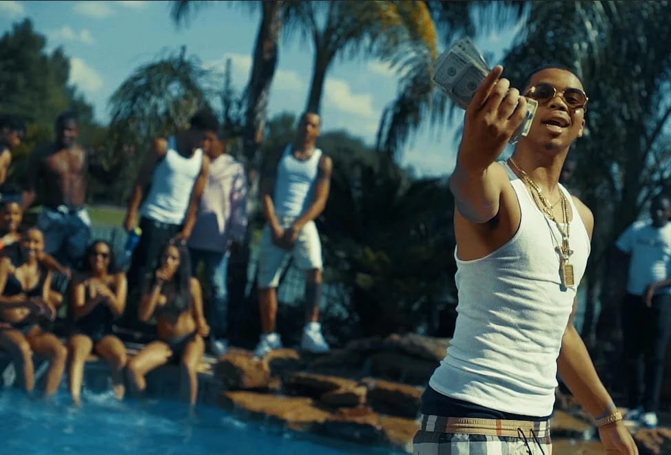 Enzo McFly keeps Houston flossy in his “Dead Presidents” Visual