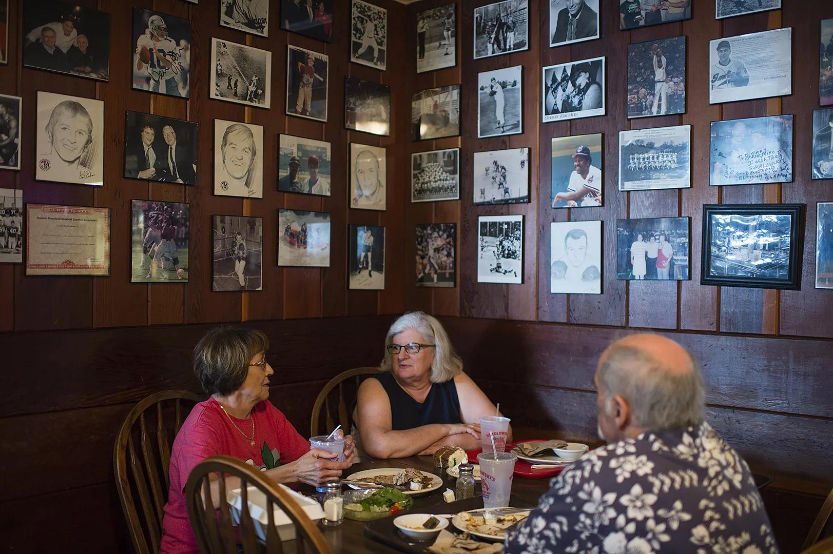 Patron's can enjoy a homey atmosphere in one of the three dining rooms at Sokolowski's University Inn, each filled with historic photos of Cleveland sports, local history and plenty of images of The Pope. (Dustin Franz/The Washington Post)