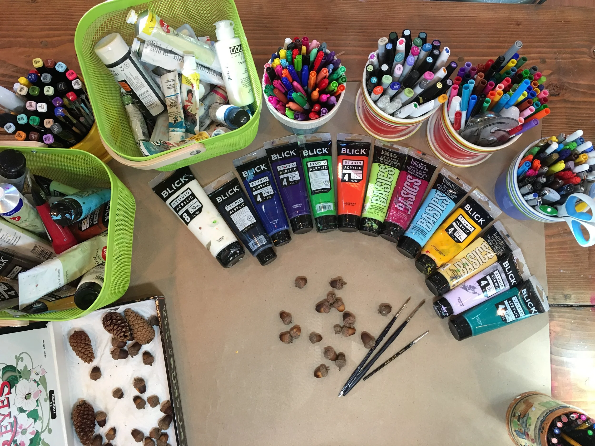 I tried a variety of acrylic paints with semi-opaqued to opaque covering properties and liked the opaque the best..