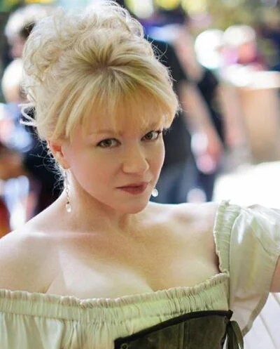Janet "Jan" Baker (alto, flute)