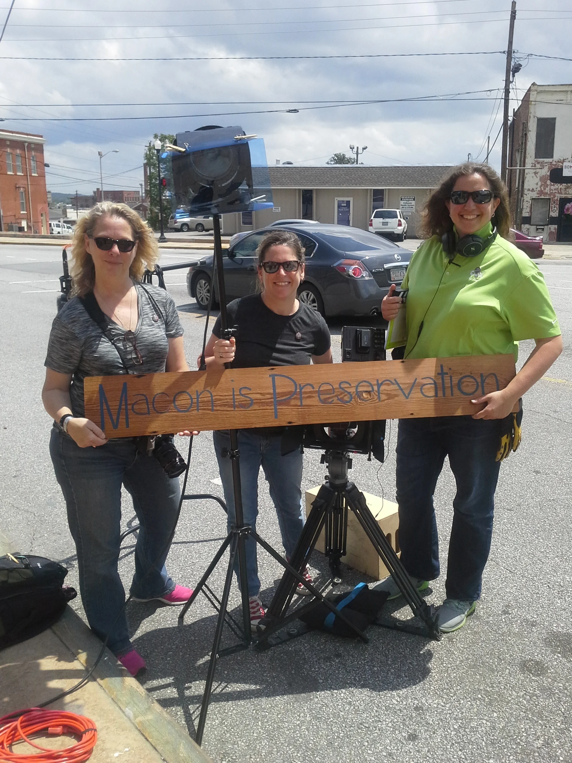 Tabitha Walker and Stephanie Shadden from Big Hair Productions and Maryann Bates from Maryann Photography take a break during a busy day of shooting.