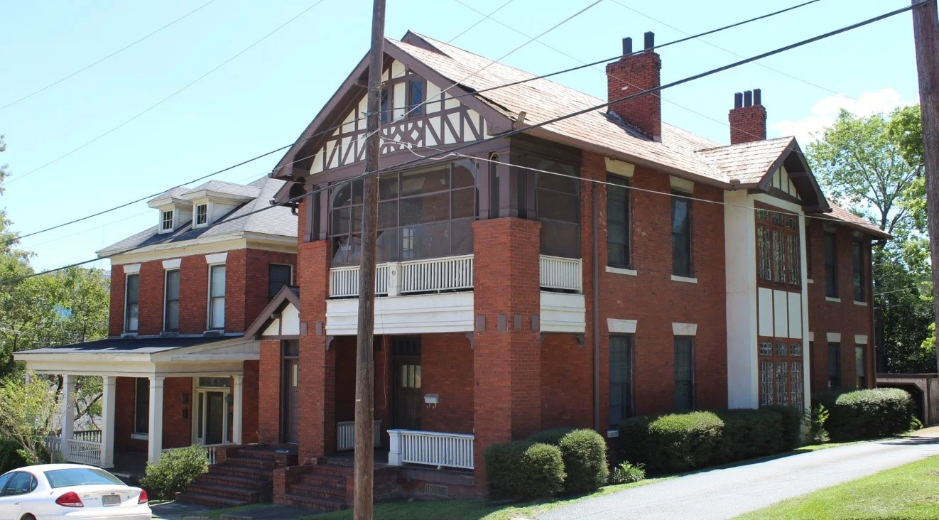 The Mayor and City Council of Macon sold the land that both of these two houses sit on to A.E. Barnes on June 2, 1906, and the parcel has remained one unit ever since. Designed and built as duplexes, countless tenants have resided in these buildings. Eventually, A.E. Barnes III, noted Macon businessman and real estate developer, inherited the property, and he sold the property for $5 to his son Waddell Barnes on November 2, 1972. The property remained in the Barnes family until July 29, 2015 when it was sold to the Macon-Bibb County Hospital Authority. The threat to the A.E. Barnes Duplexes is pending demolition. In June 2017, the Hospital Authority offered the buildings and a nearby lot to HMF if we could move the houses by March 2018. Additionally, they offered to donate the expense they would incur on demolition, which is estimated to be $20,000. Unfortunately, the cost to relocate the houses is estimated at over $100,000 per house. Given the impracticality and high cost of relocating the masonry duplexes, HMF hopes to continue working with Navicent to pursue other options to reuse these buildings in situ.