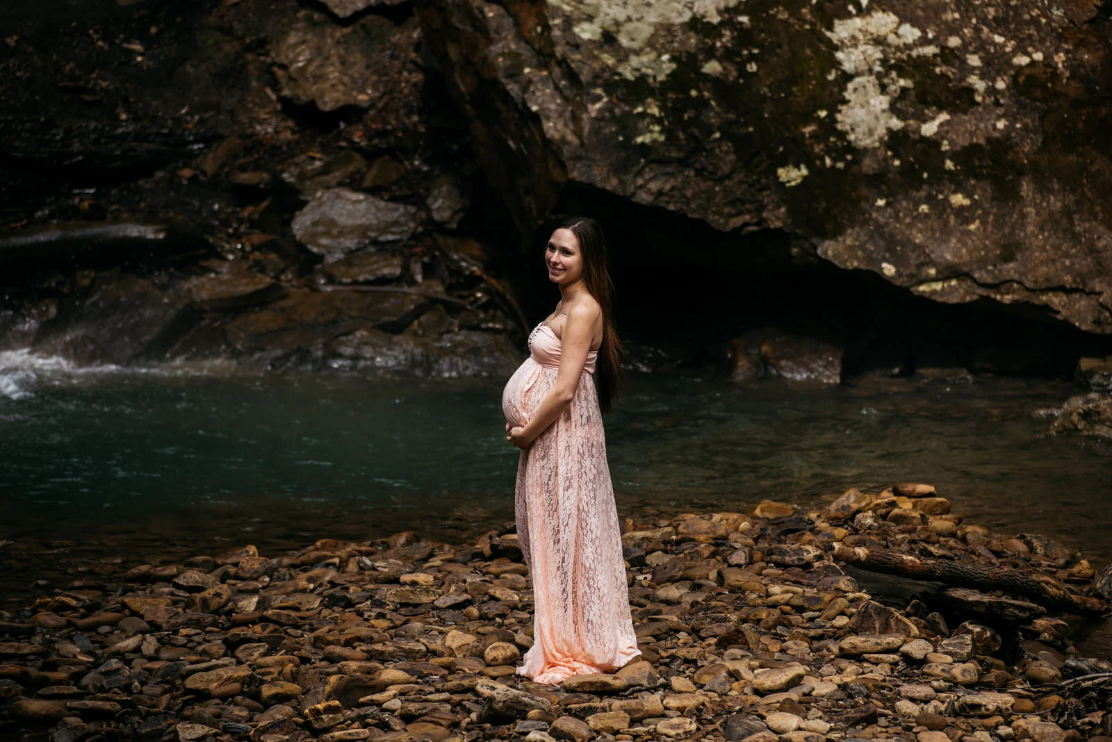 mom poses at waterfall in ohiopyle