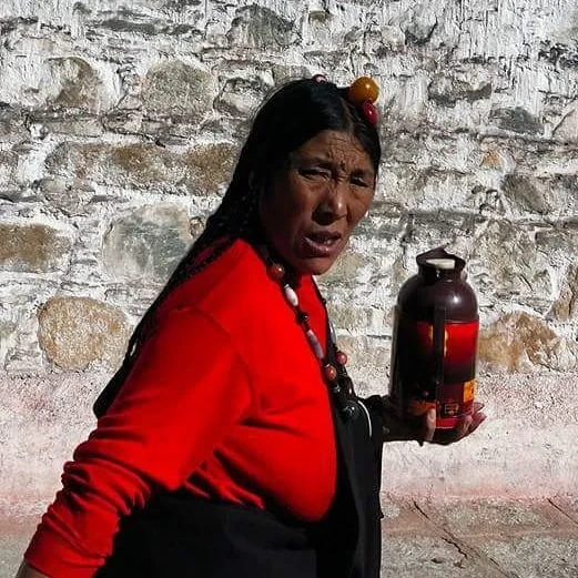 Tibetian woman bringing yak butter to pray.

#wanderlust #ilovetravel #writetotravel #instatravelling #instavacation #travelblogger #instapassport #postcardsfromtheworld #traveldeeper  #travelstroke #travelling #trip #traveltheworld #igtravel #getawa