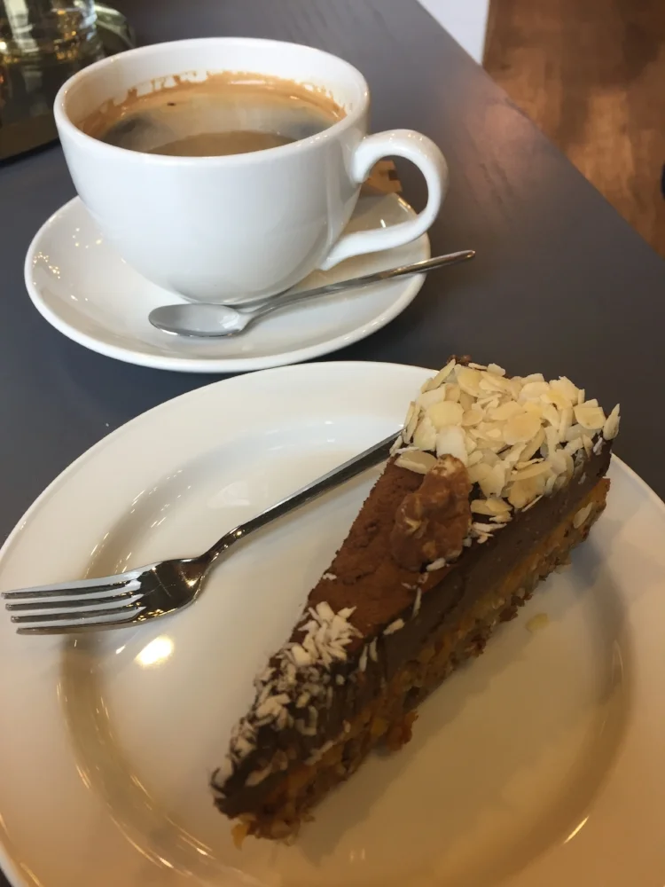 Chocolate cake and coffee at Knygu Ministerija Knygyna