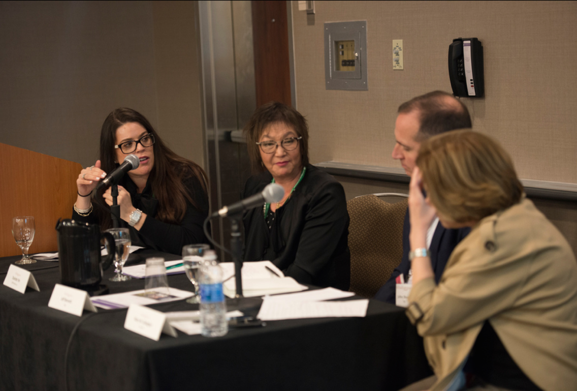 Elena Speaking on Panel.png
