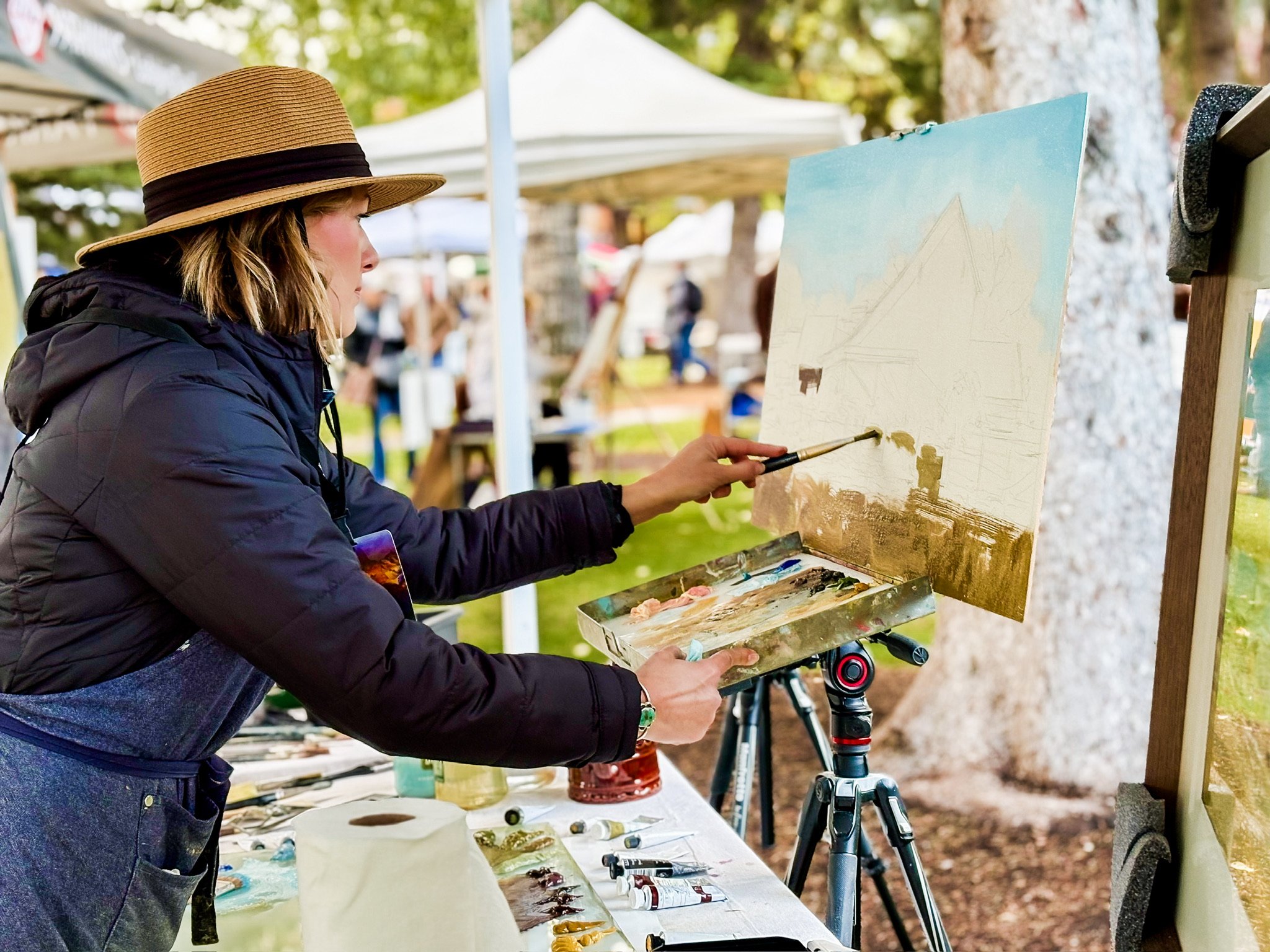 Landscape painter Allie Zeyer at the Jackson Hole QuickDraw event on the Town Square 2025