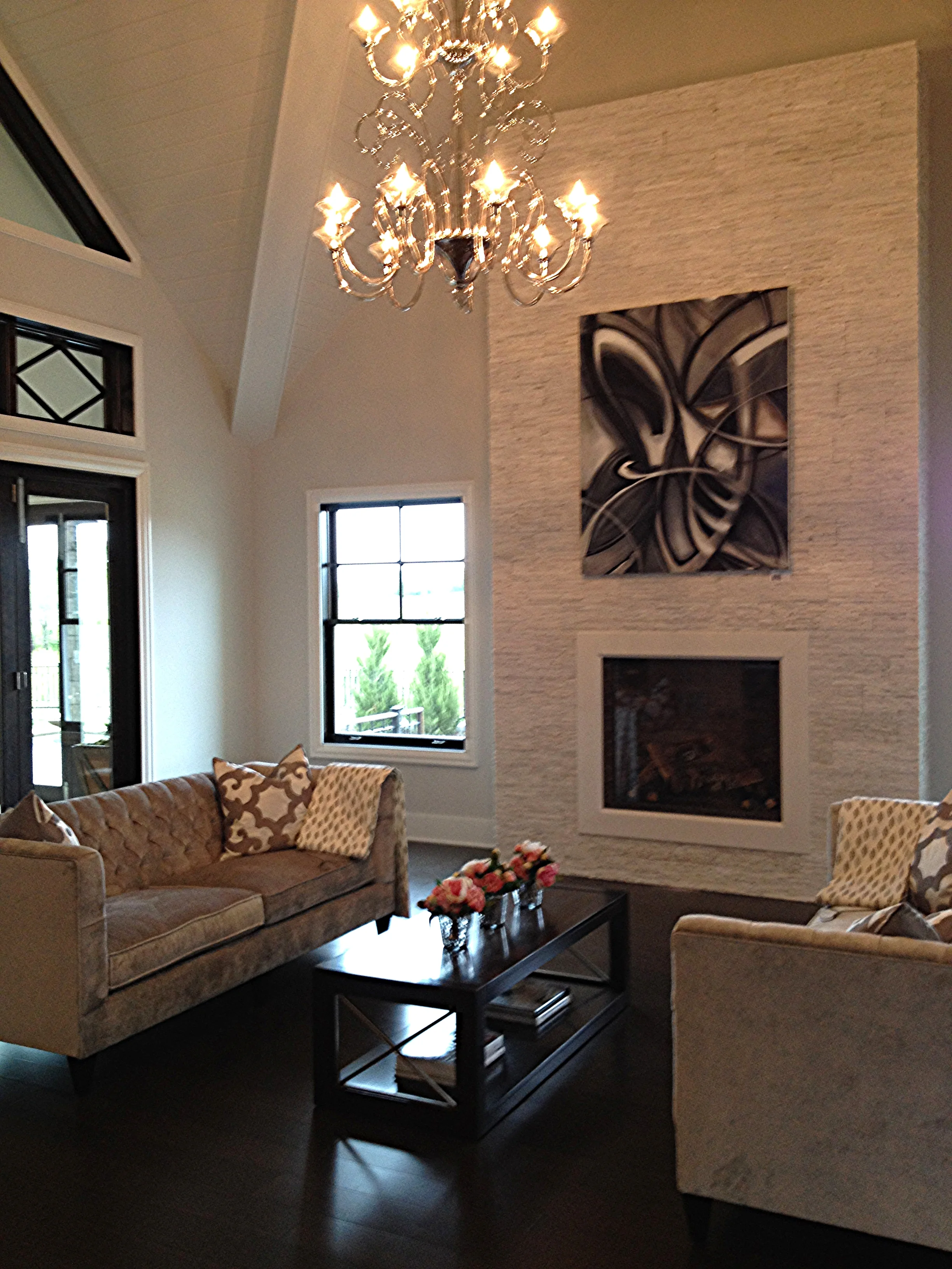 This modern abstract painting carries the eye upward to other unique architectural elements of the space. 
