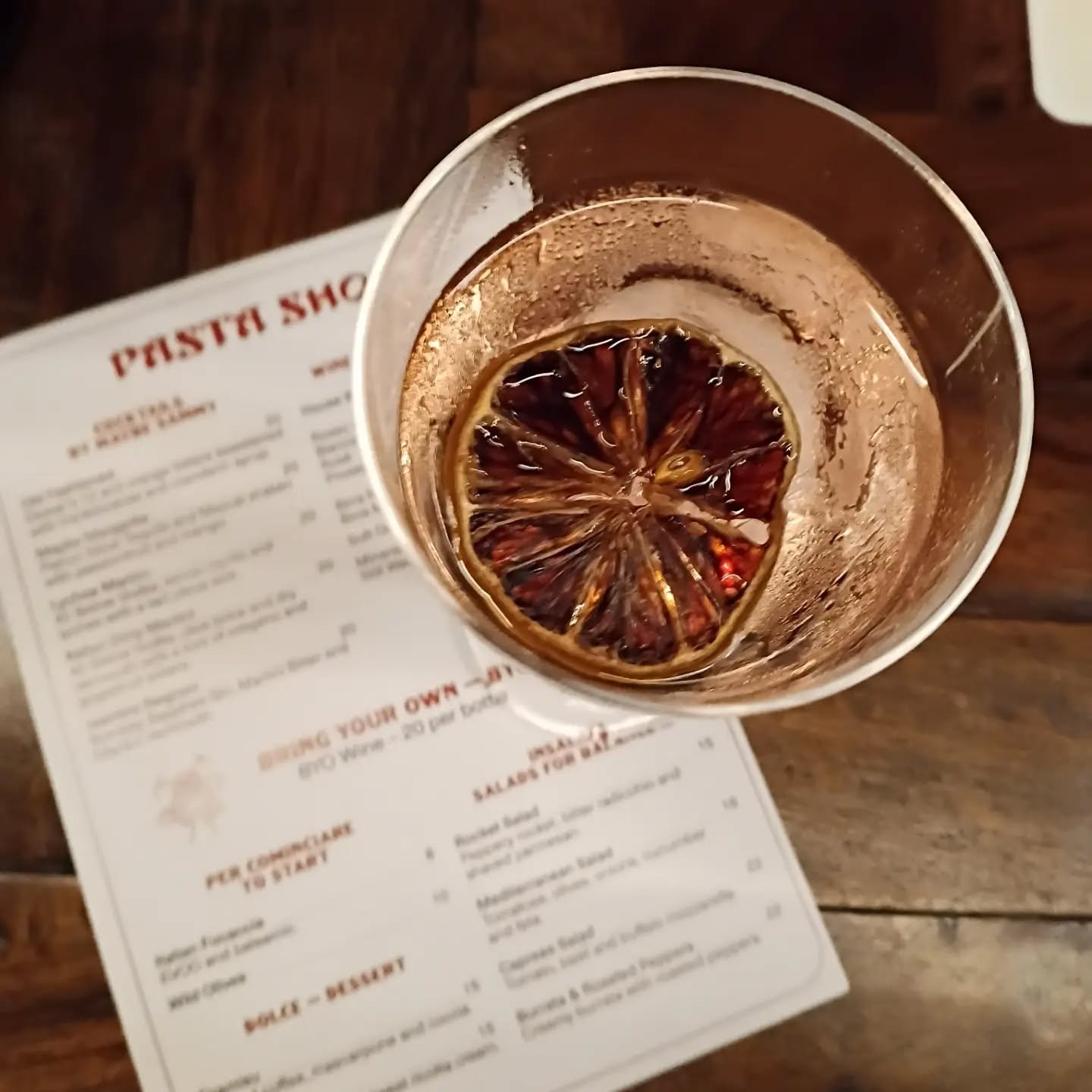 On a corner in Potts Point the @pastashopsydney is pumping on a wet Friday night. 

It's a no bookings situation, so the locals have already trained themselves to line-up early. 

Thanks to the recent standing- when-drinking State law changes - at la