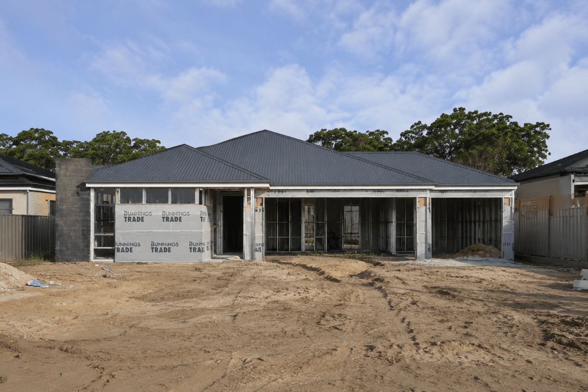a photo of a dual key home under construction on a building site