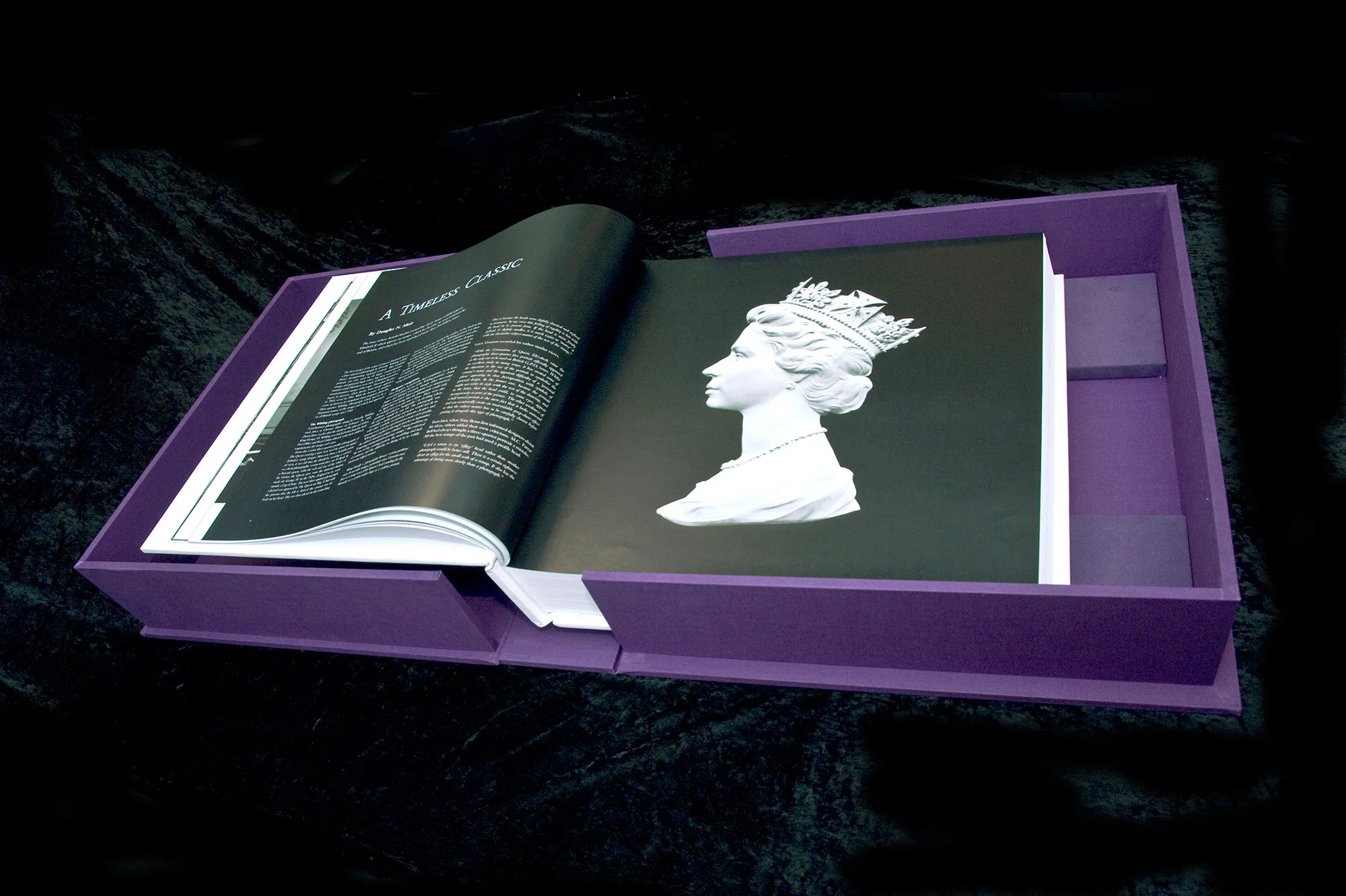 The book within it's lavish silk covered box, showing an image of the original cast of Queen Elizabeth II, which was used to create stamps and currency . Book design by Martin Sully.