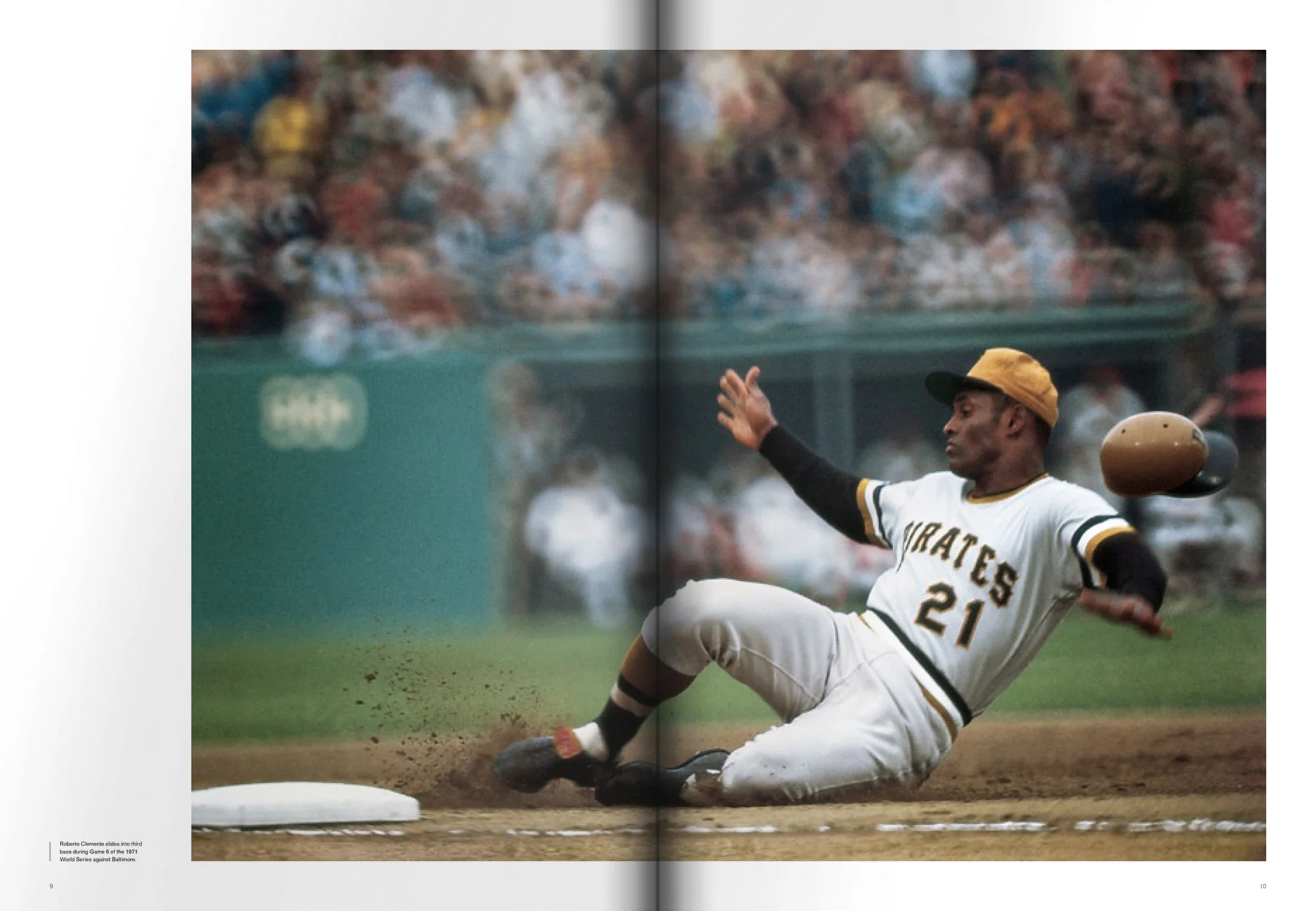 Roberto Clemente sliding into base