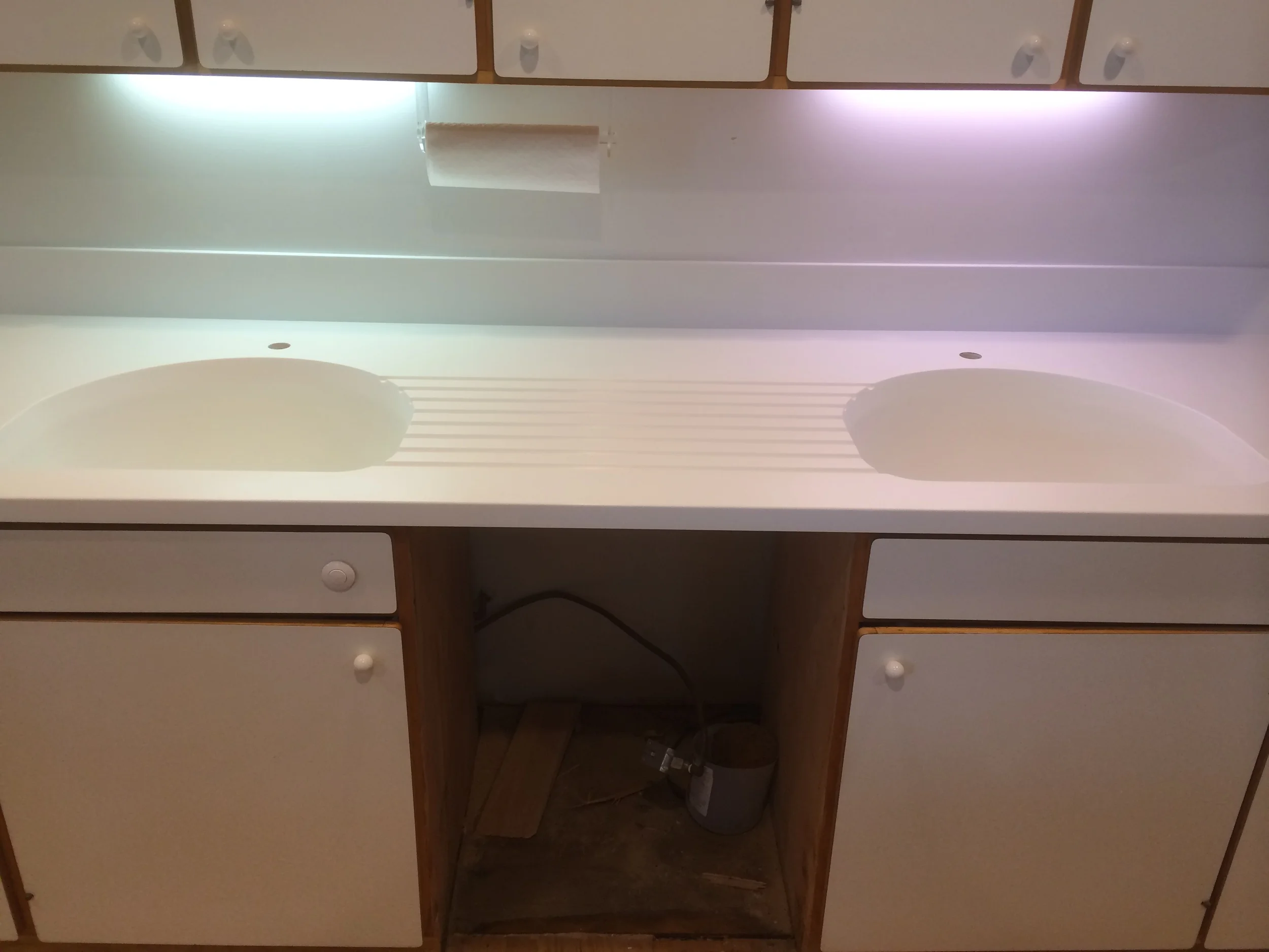  Corian Counter with Double Corian Seamless Sinks and Custom Routed Drain Boards 