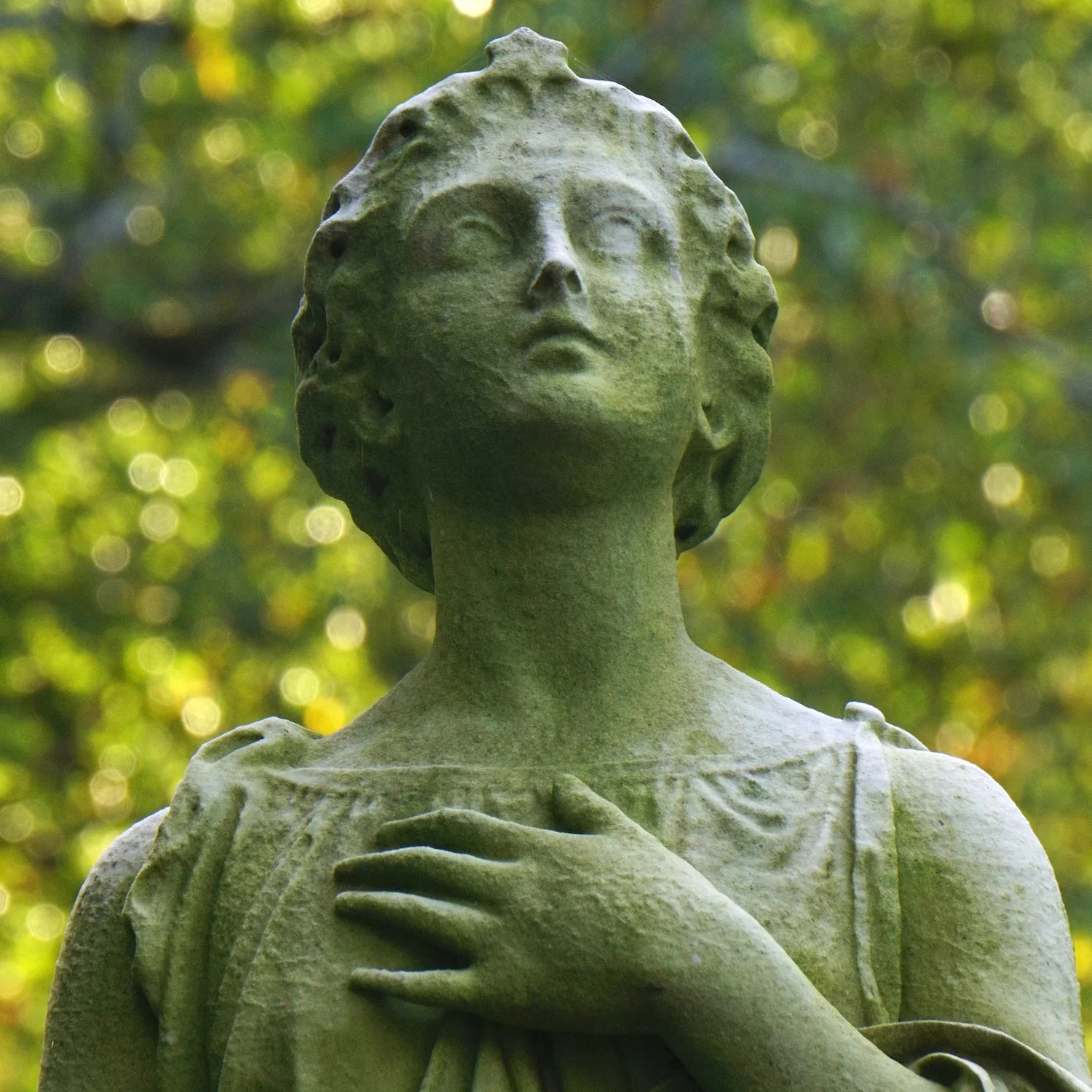 green background statue