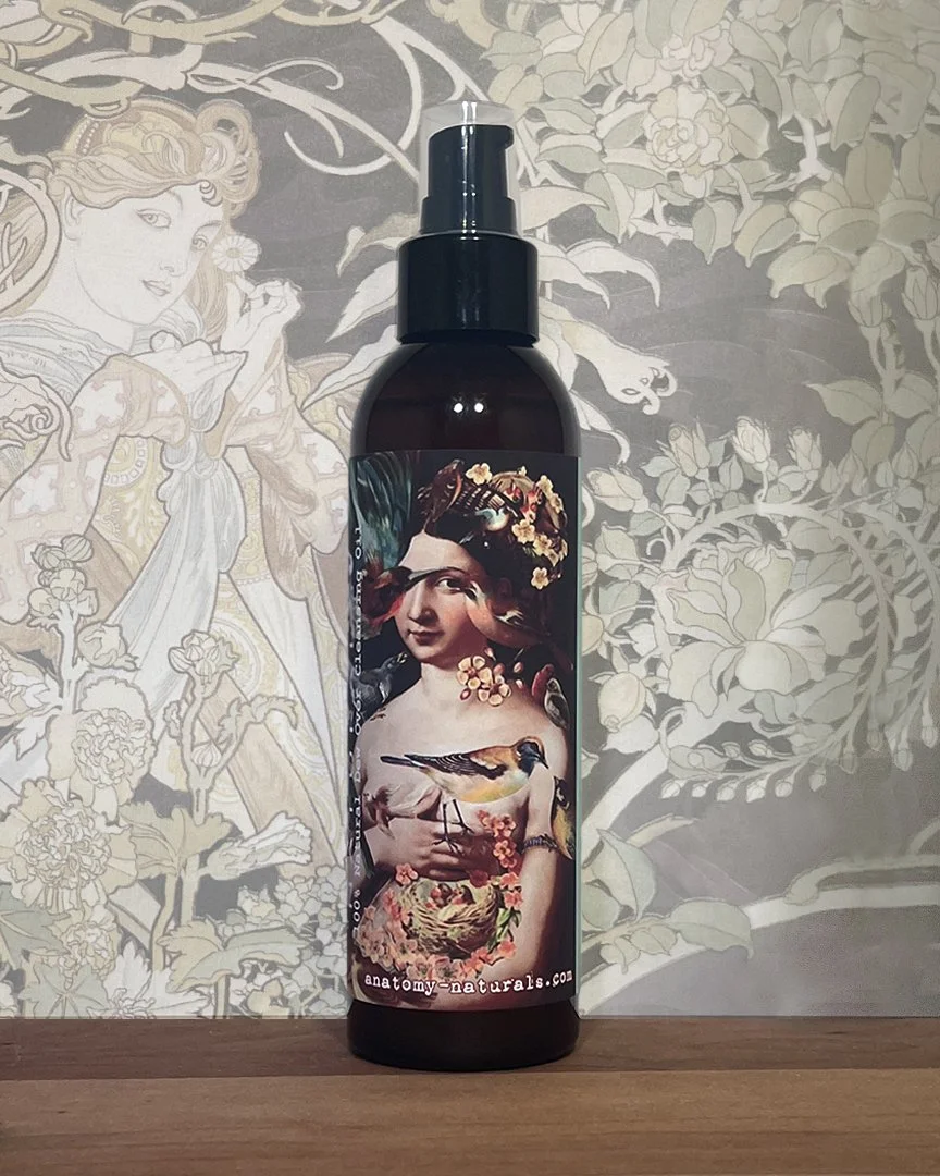 Dew Over Facial Cleansing Oil in amber pump bottle on bathroom vanity
