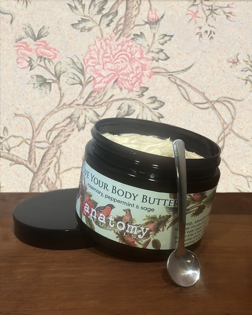 love your body butter open jar with silver spoon