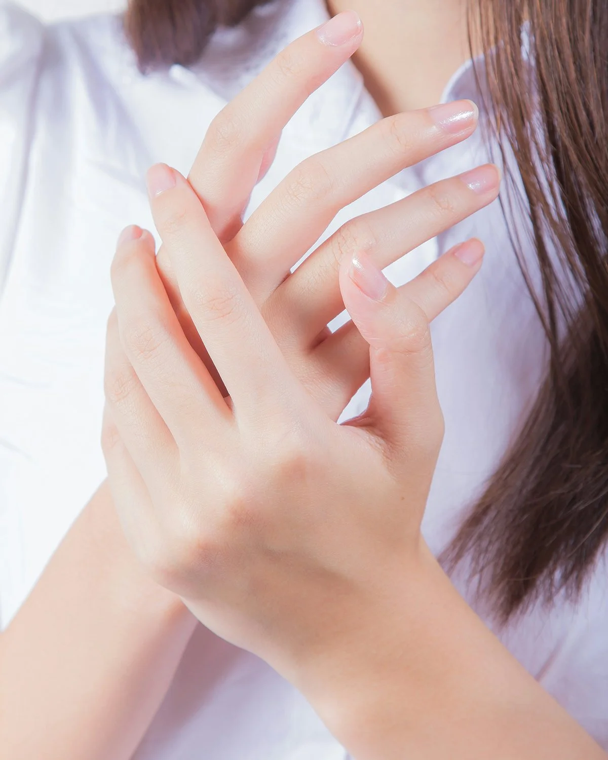 hand balm lotion stick showing soft hands from use