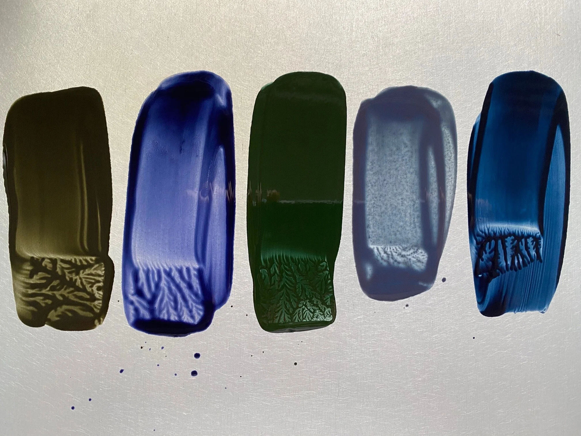 From left to right on the heated palette: Turkey Umber Greenish, Payne’s Grey, Courbet Green, Blue Ochre, and Indigo.