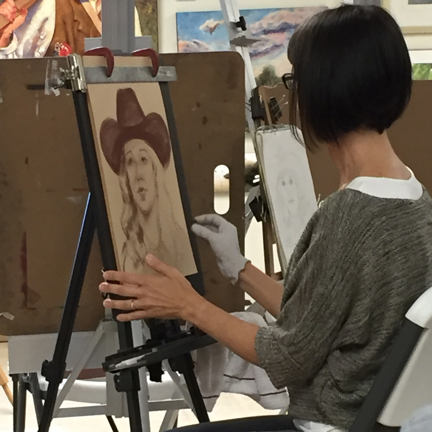 Artist Rita Kirkman at work on a portrait from life - Valentine Nebraska Art Workshop