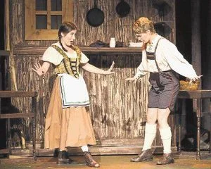 Deji Osinulu Megan Berti (right) is seen here as Hänsel in Oh!’s Hänsel und Gretel in 2014. (Allison Pohl is Gretel.) Berti sings the role of Cenerentola in Rossini’s La Cenerentola at Opera in the Heights Feb. 5–13.