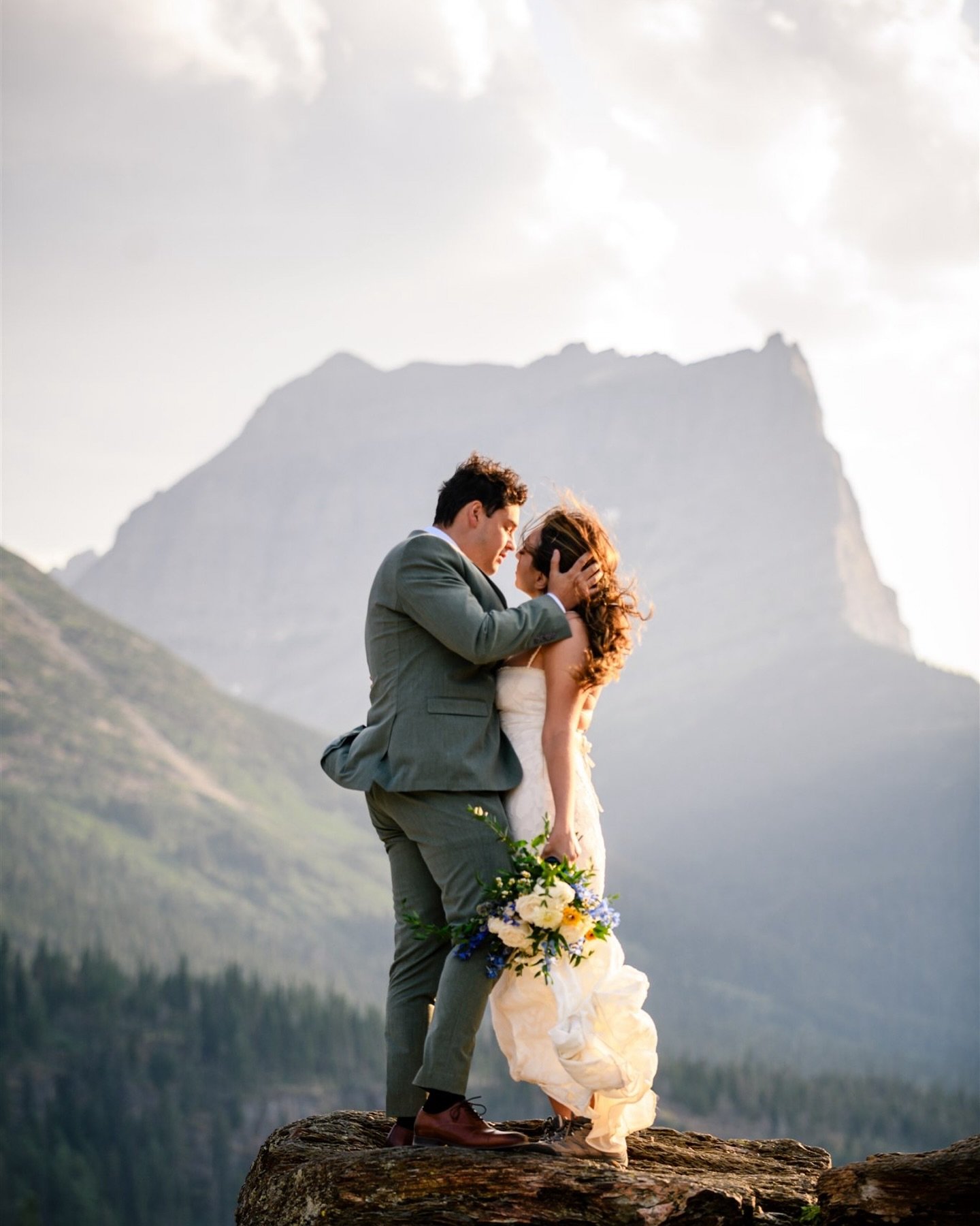 a little wind never hurt elopement photos in Glacier..only added the most perfect romantic touch! ✨ a few favorites with Anna &amp; Elio last summer 🤍

#ElopementGoals #GlacierNationalPark #MountainElopement #NatureWeddings #GlacierLove #AdventureEl