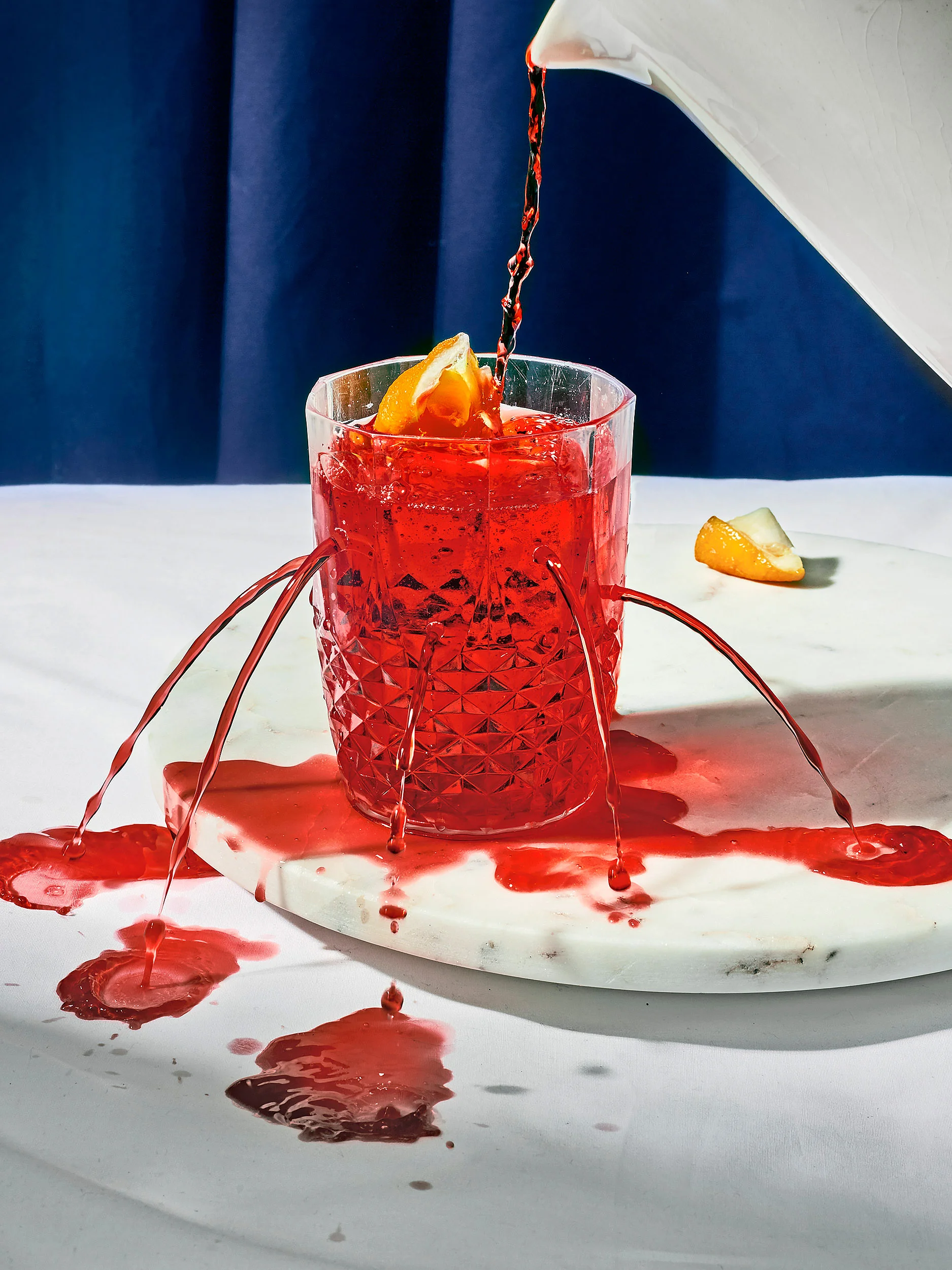 how to make a bottomless negroni. take an empty glass. full it half up. keep on filling it. Photography & Art Direction: Henry Trumble