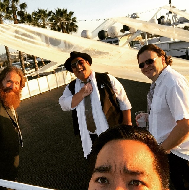 Graeme Hinde, Manny Decoria, Rich Smith, & Eric Volfango relaxing before Casual Encounters Live Band Karaoke performs at a wedding reception aboard the FantaSea One yacht.
