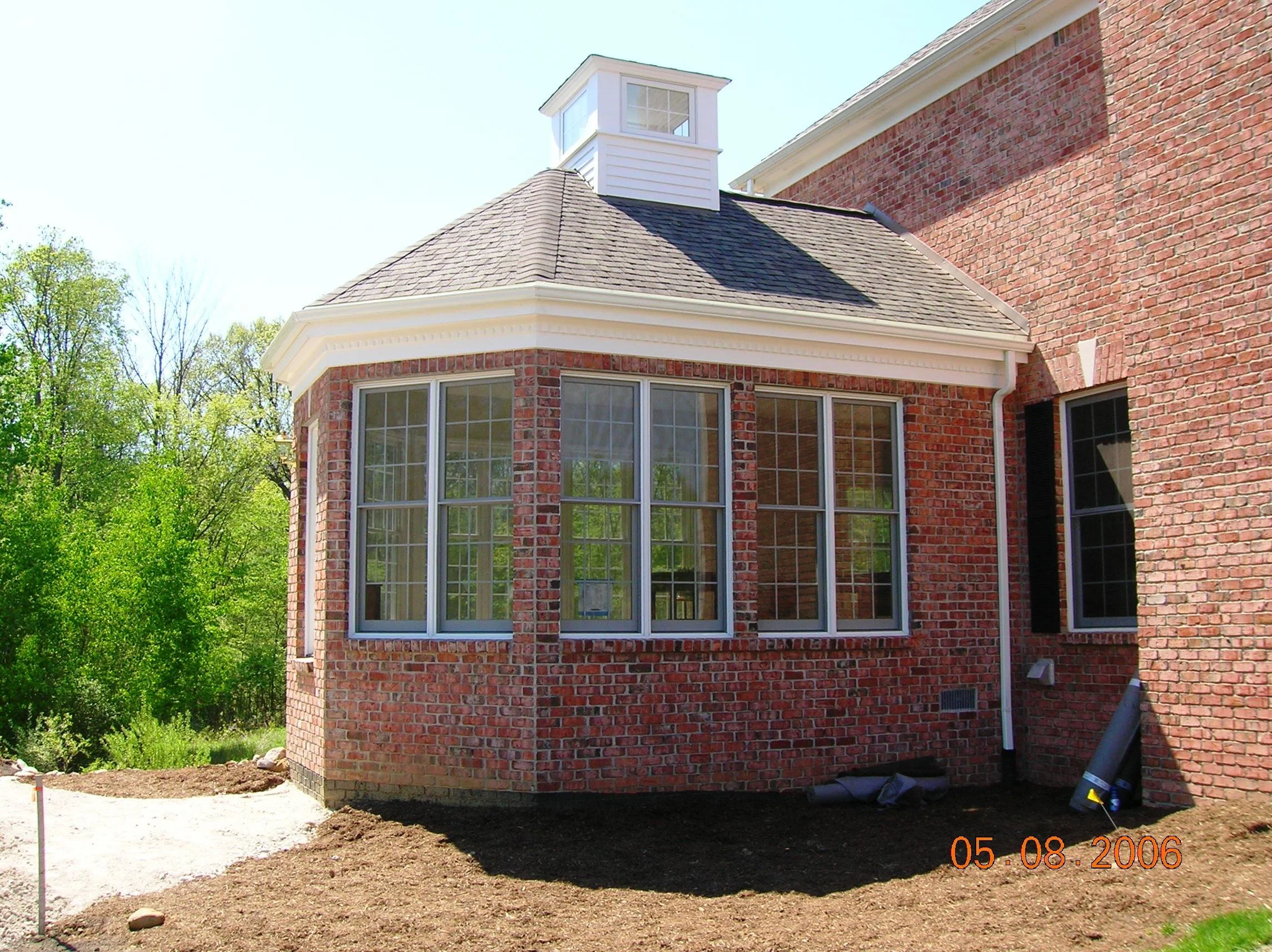 custom-sunroom-two-tier-patio-cupola-stargazing-exterior-addition.jpg