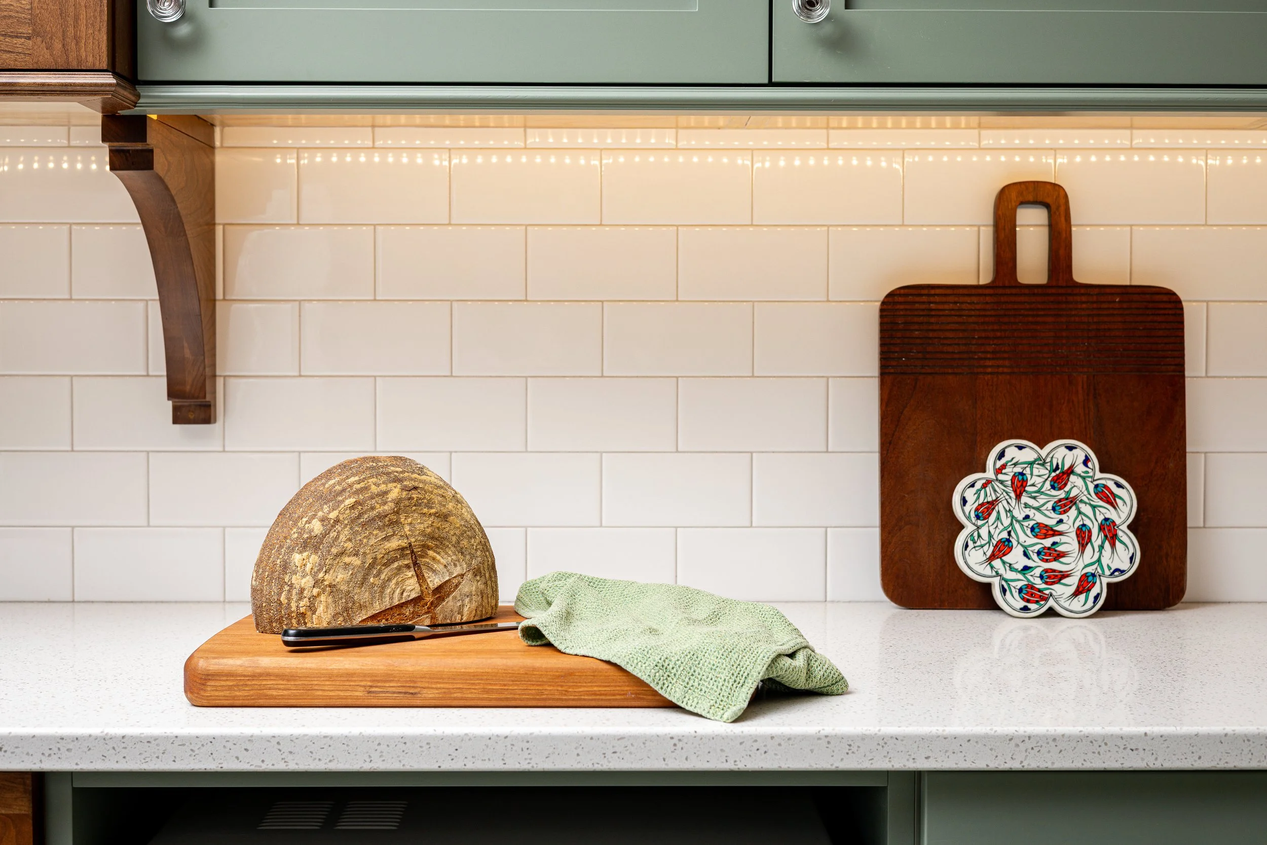 fresh-baked-bread-on-snowbank-white-quartz-countertop.jpg.jpg