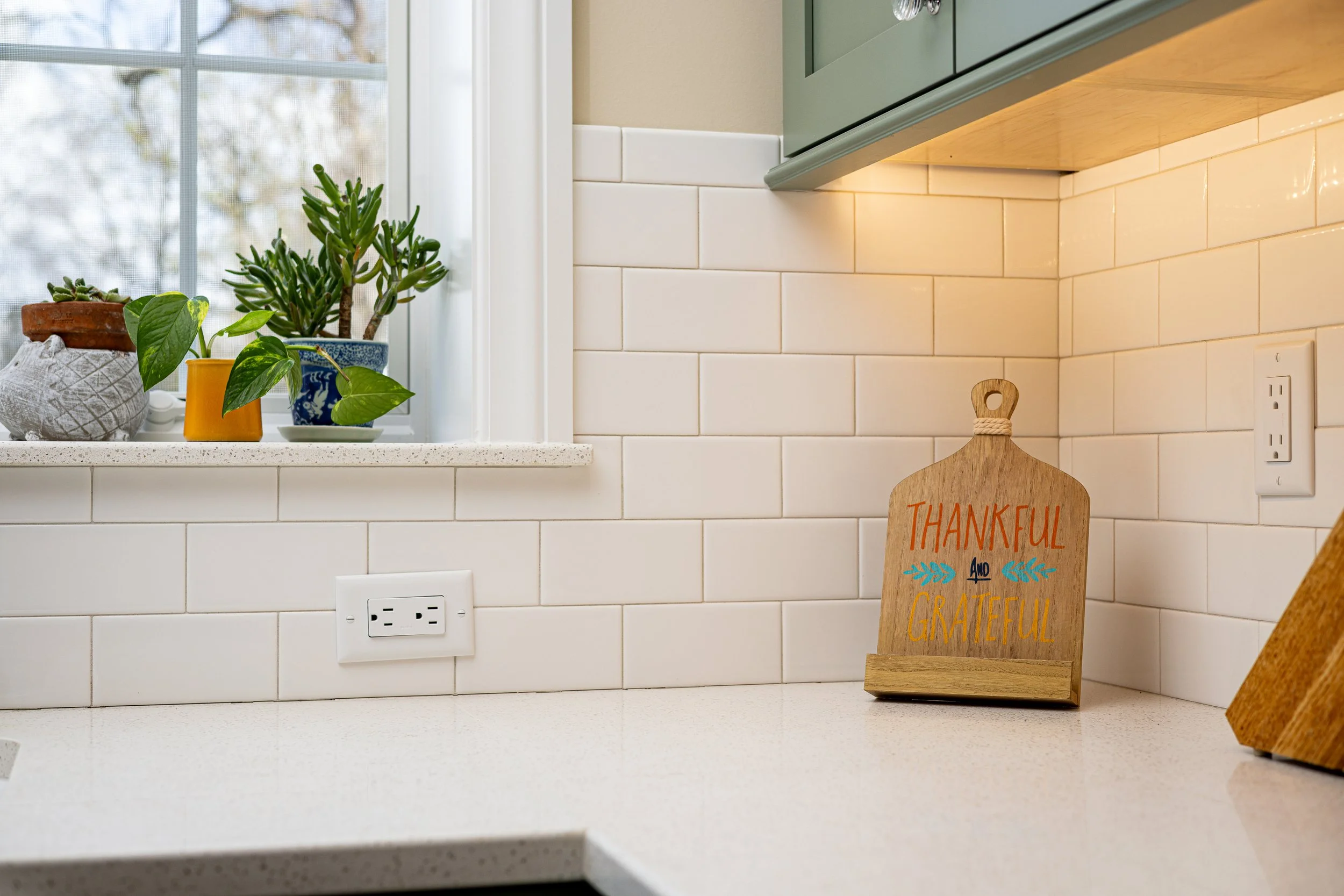 white-subway-tile-kitchen-backsplash-sage-green-cabinets.jpg.jpg