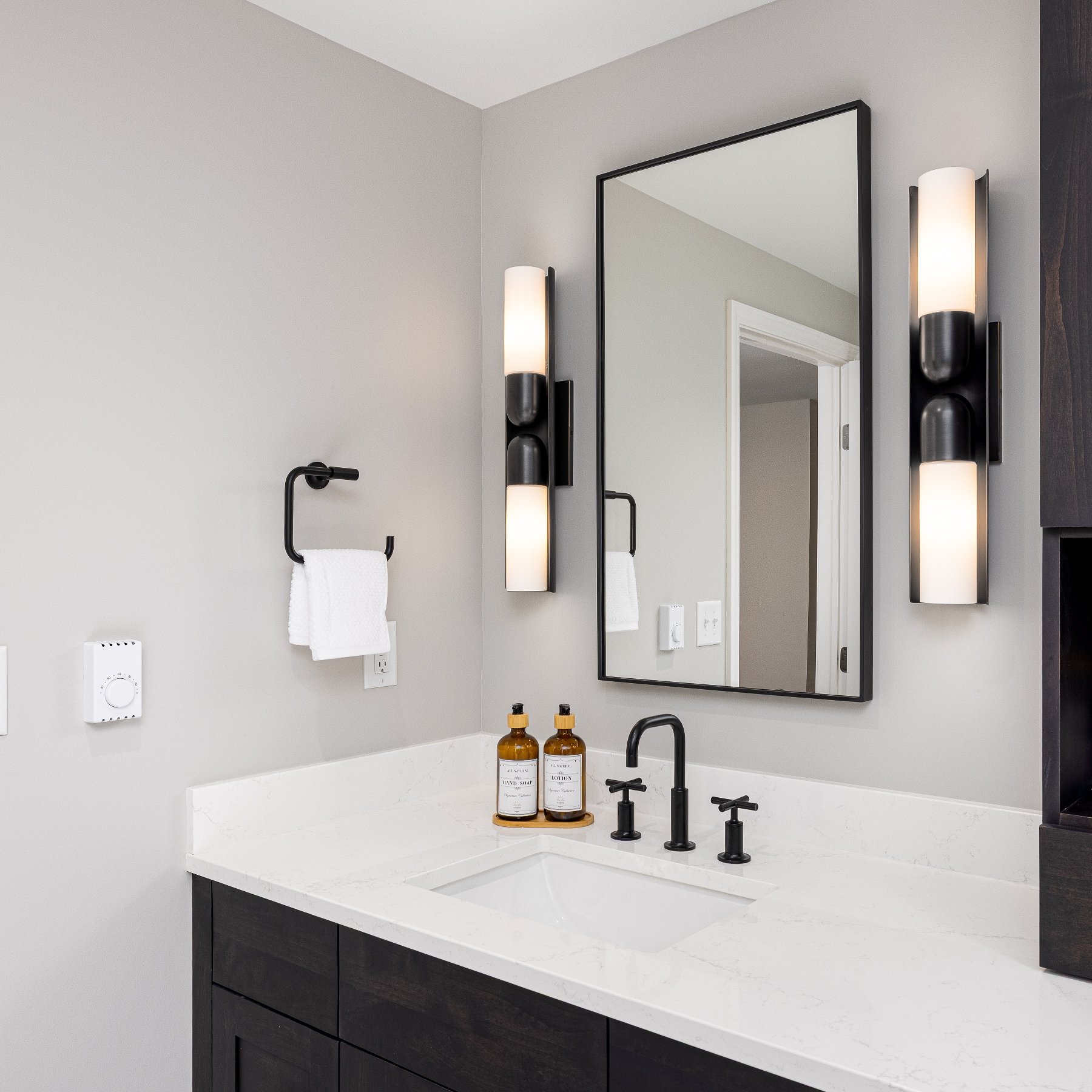 primary bathroom 005 modern-primary-bathroom-vanity-quartz-countertop-black-mirror.jpg.jpg