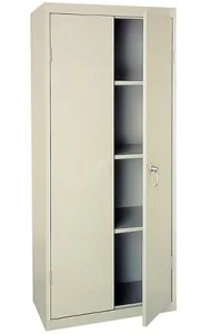 Obviously this is a "before" photo. This is a typical metal storage cabinet that most people keep in their garage. I bought it because the last building I lived in had a storage room so I kept some extra items in it.