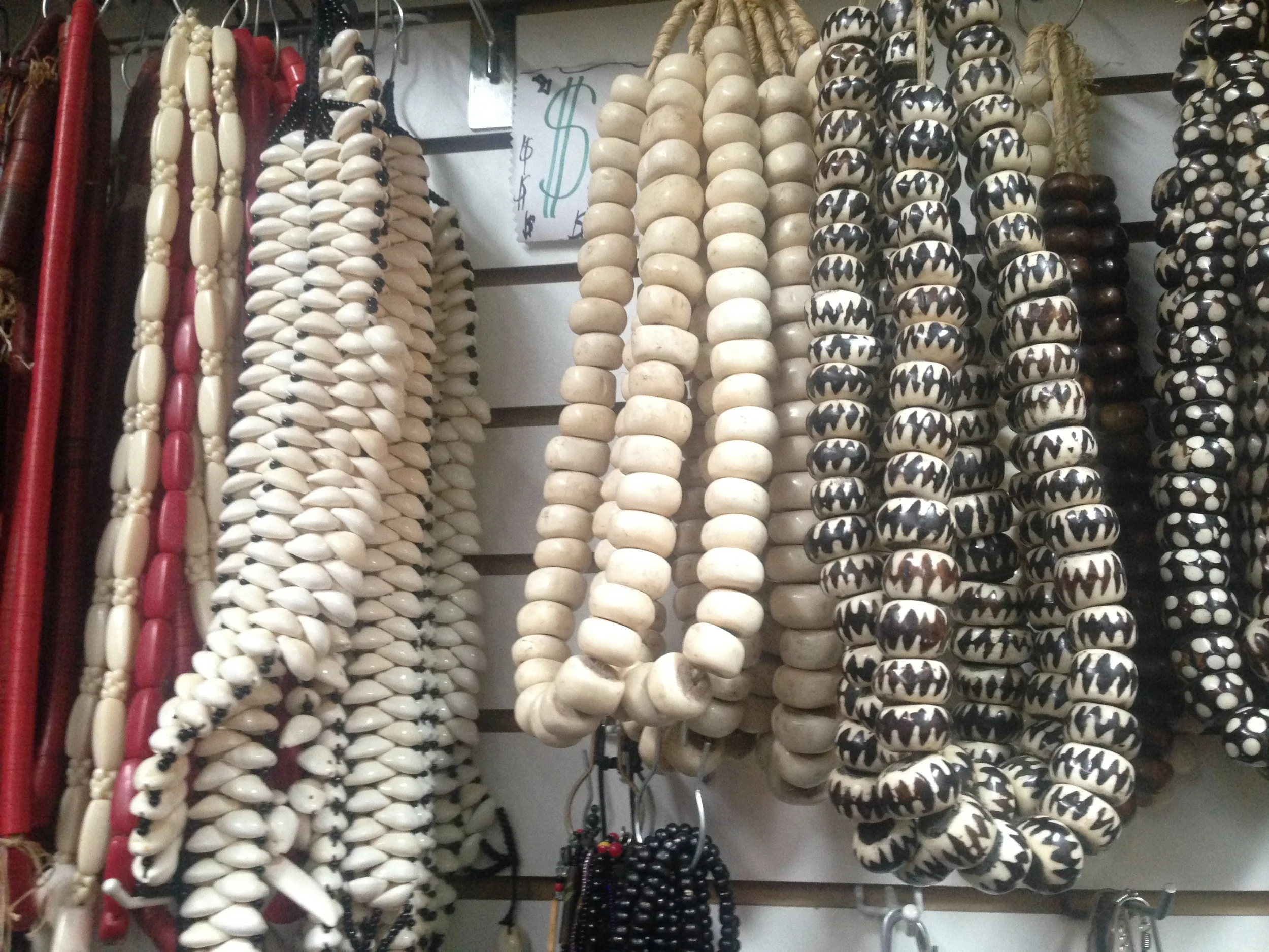 Kaarta Imports and Export on 125th Street: The strands on the right of the $ sign are the camel bone. They cost $30. 
