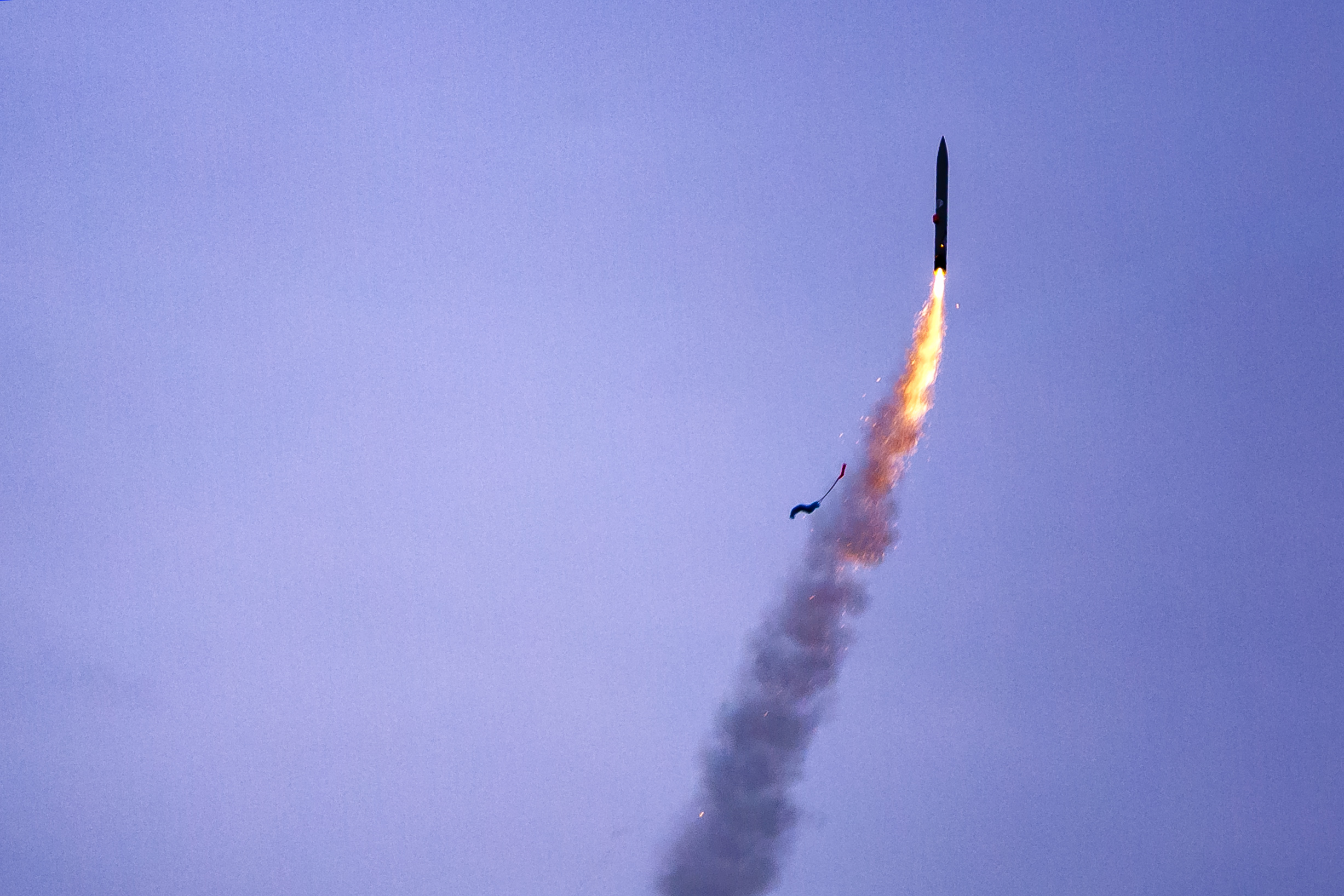 Deploying the paratrooper payload and re-orienting to upright