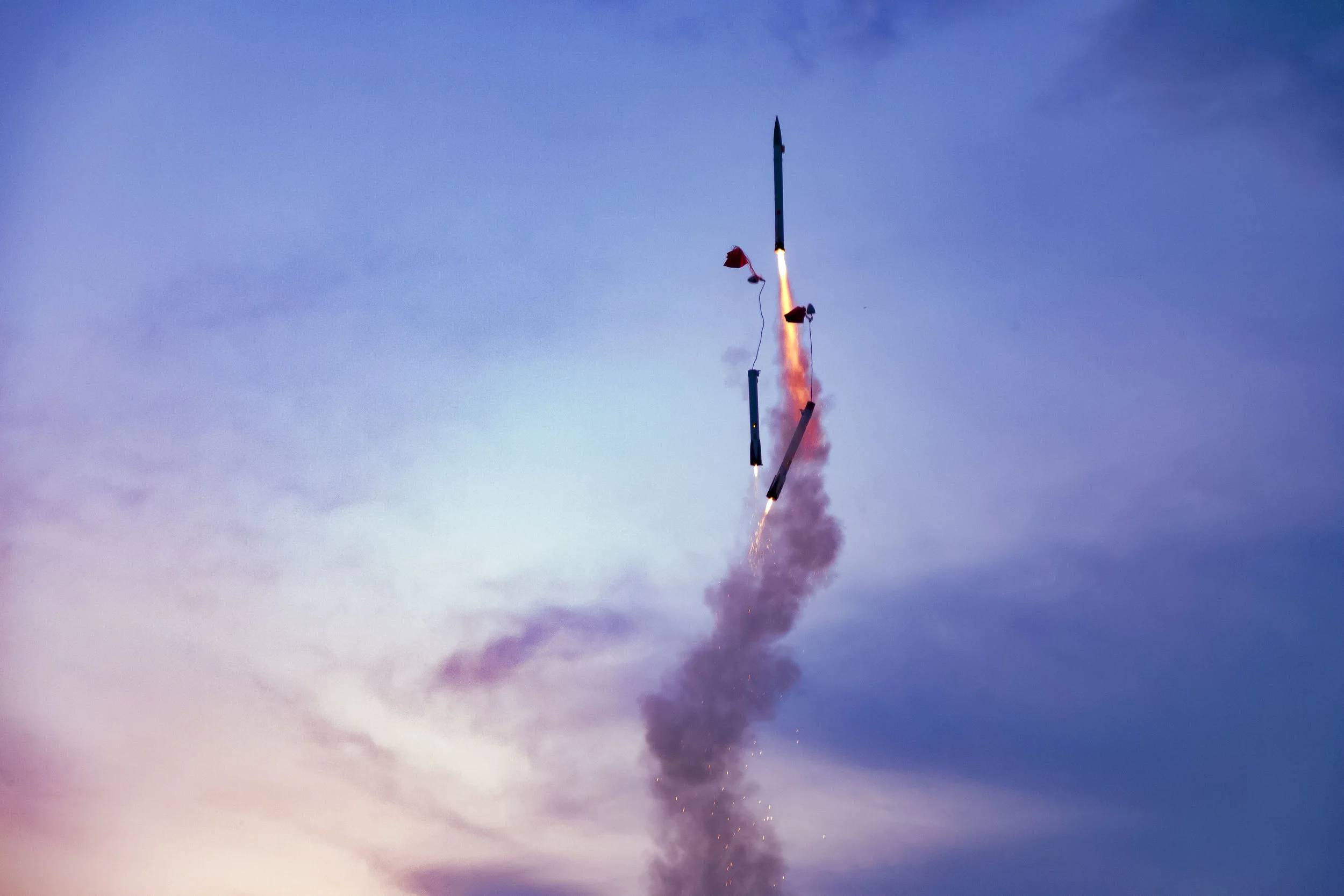 Slightly early chute deployment on the side boosters