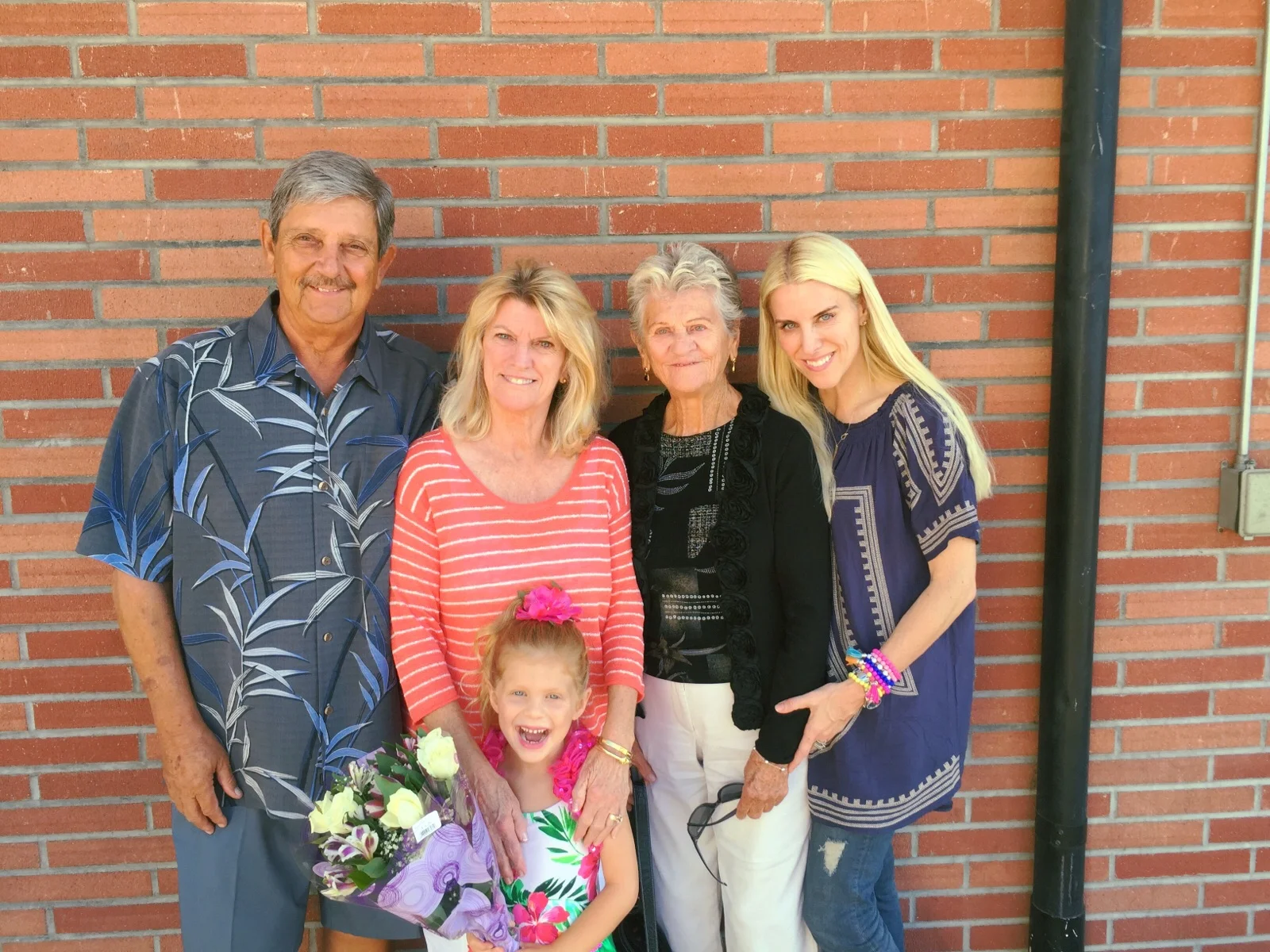 This is my family (my parents and my grandmother) and the little dancer herself!! 