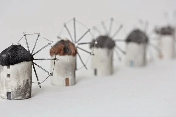Laurie Poast. Windmills of Holland, 2010. Clay, pigment, and steel.