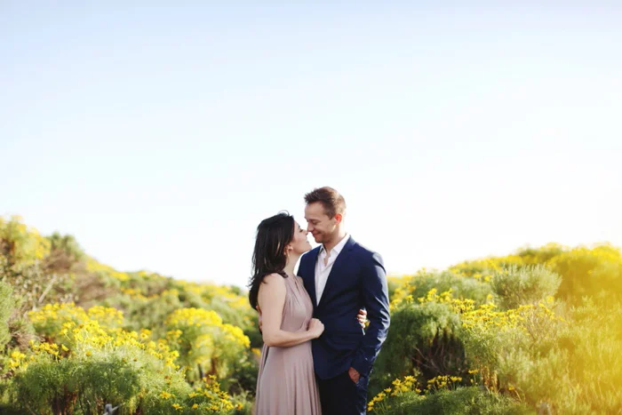 malibu southern california engagement photography oceanside cliff sunflower field