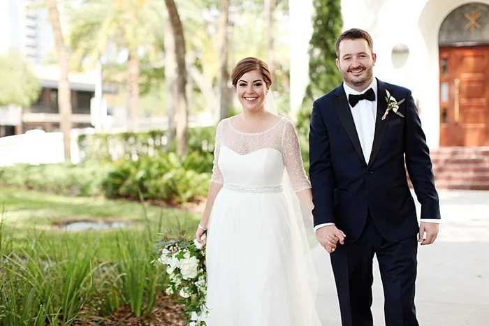 glamorous black tie navy gold and peach downtown orlando wedding photography