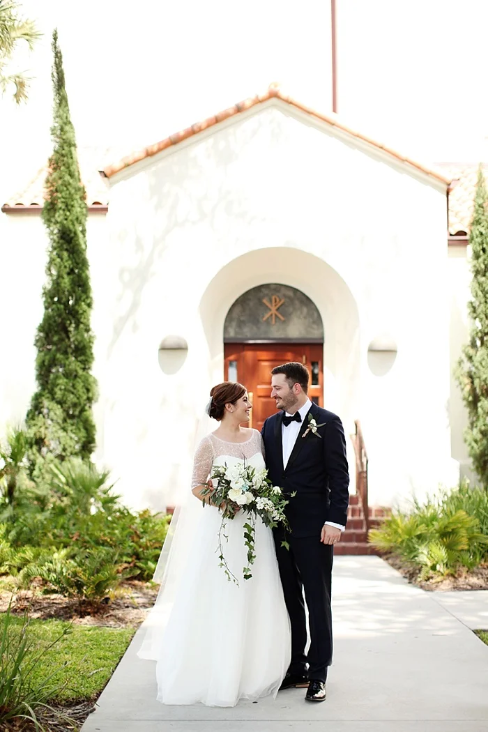 glamorous black tie navy gold and peach downtown orlando wedding photography