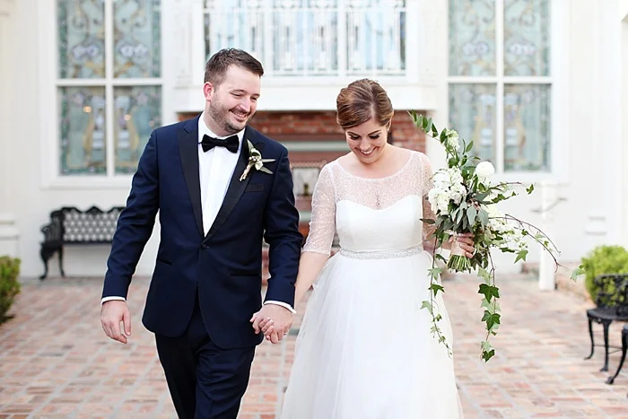 glamorous black tie navy gold and peach downtown orlando wedding photography