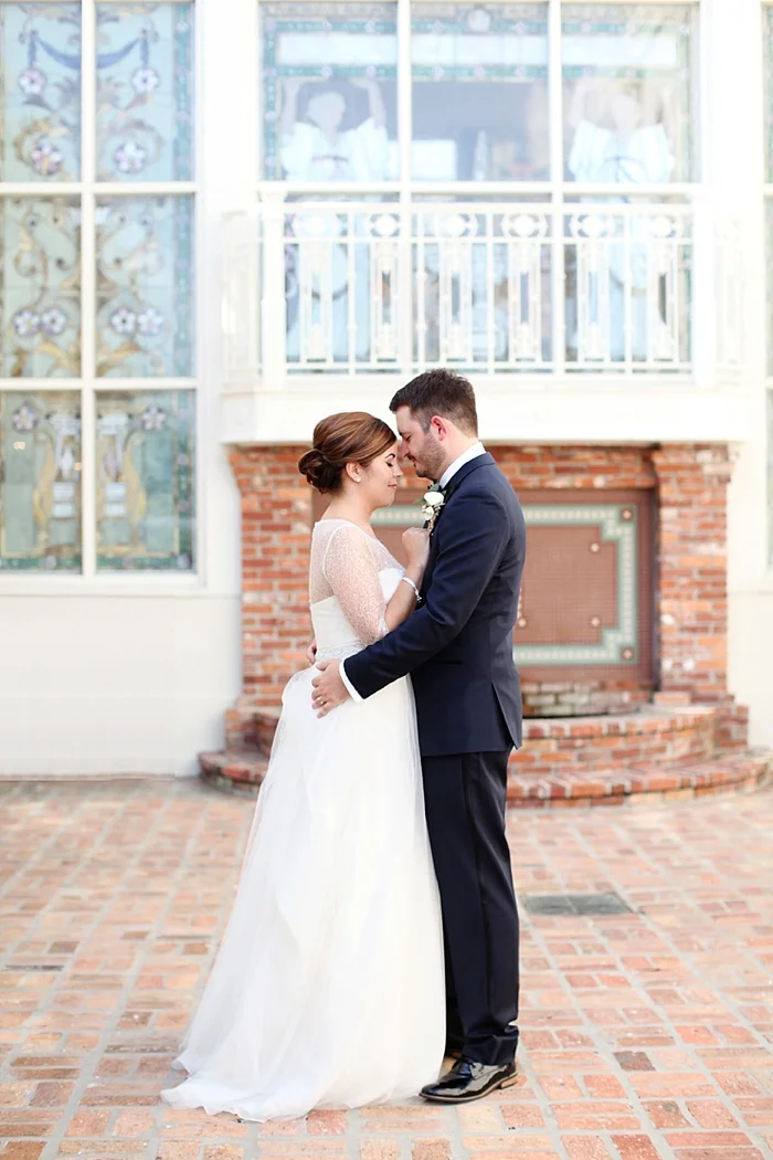 glamorous black tie navy gold and peach downtown orlando wedding photography