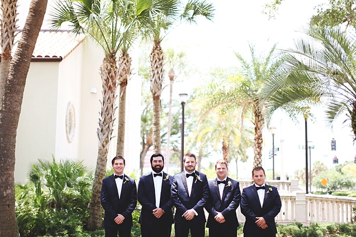 glamorous black tie navy gold and peach downtown orlando wedding photography