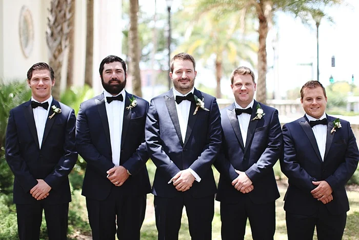 glamorous black tie navy gold and peach downtown orlando wedding photography